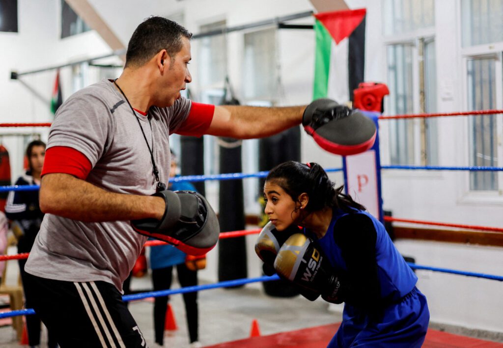 As bombs shatter Gaza, boxing coach emboldens girls