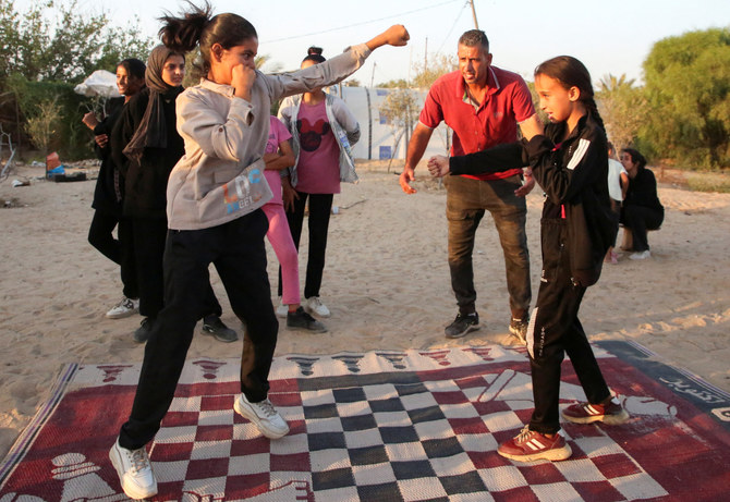 Palestinian girls are learning how to box in an open air